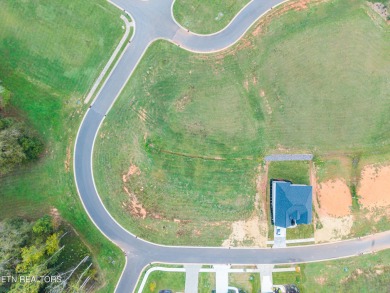 Nestled within an exclusive golf community, this stunning lot on Tennessee National Golf Club in Tennessee - for sale on GolfHomes.com, golf home, golf lot