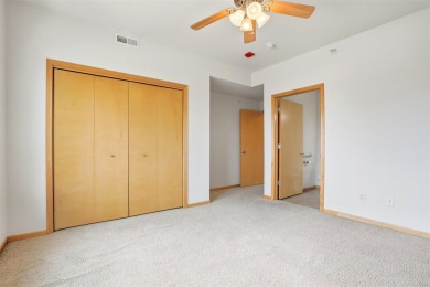 First-Floor Condo Near Blue Top Ridge Golf Course  Welcome to on Blue Top Ridge At Riverside in Iowa - for sale on GolfHomes.com, golf home, golf lot