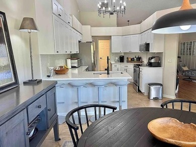 This beautiful 3BR,2B plus Air Conditioned Florida room has a on Plantation Golf Club in Florida - for sale on GolfHomes.com, golf home, golf lot