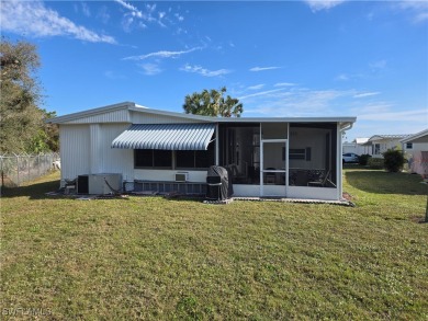 Priced to sell now !  New roof in 2024 - New front lanai blinds on Six Lakes Country Club in Florida - for sale on GolfHomes.com, golf home, golf lot