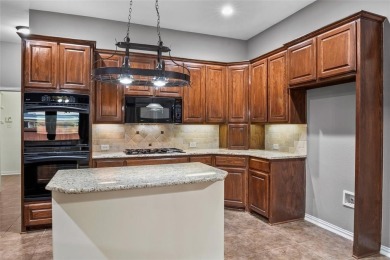 Welcome to this elegant stone-and-brick David Weekly home in the on Lantana Golf Club in Texas - for sale on GolfHomes.com, golf home, golf lot