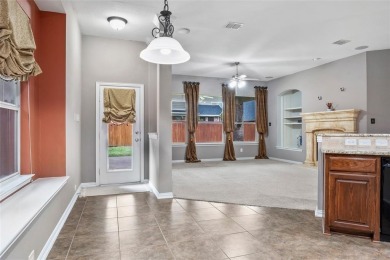 Welcome to this elegant stone-and-brick David Weekly home in the on Lantana Golf Club in Texas - for sale on GolfHomes.com, golf home, golf lot