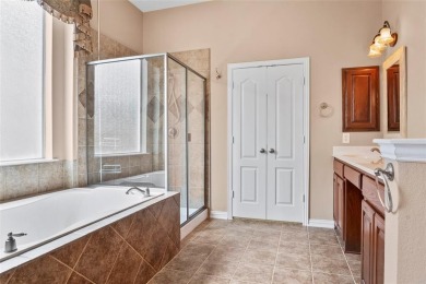 Welcome to this elegant stone-and-brick David Weekly home in the on Lantana Golf Club in Texas - for sale on GolfHomes.com, golf home, golf lot