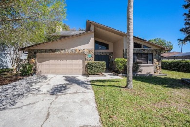 Welcome to your own private retreat in one of Tampa's most on Northdale Golf and Tennis Club in Florida - for sale on GolfHomes.com, golf home, golf lot