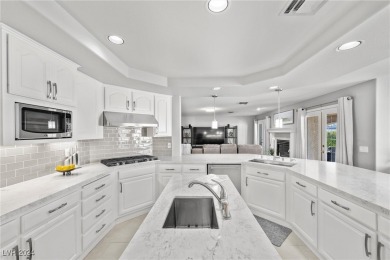 Discover this beautifully upgraded two-story stunner. Perched on on The Legacy Golf Club in Nevada - for sale on GolfHomes.com, golf home, golf lot