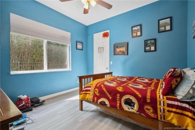 Welcome to this beautiful, spacious, Hermitage model 4-bedroom on Hammock Creek Golf Club in Florida - for sale on GolfHomes.com, golf home, golf lot