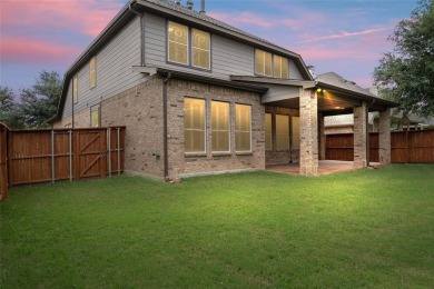 Welcome to this elegant stone-and-brick David Weekly home in the on Lantana Golf Club in Texas - for sale on GolfHomes.com, golf home, golf lot