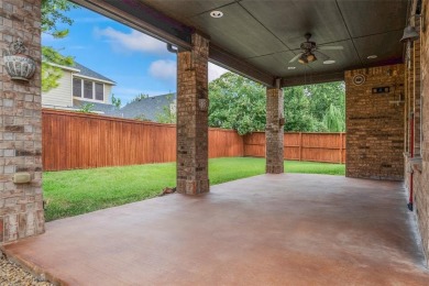 Welcome to this elegant stone-and-brick David Weekly home in the on Lantana Golf Club in Texas - for sale on GolfHomes.com, golf home, golf lot