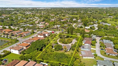 Expansive 1.22-Acre Property with Endless Possibilities in on Woodlands Country Club in Florida - for sale on GolfHomes.com, golf home, golf lot