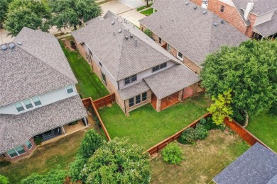 Welcome to this elegant stone-and-brick David Weekly home in the on Lantana Golf Club in Texas - for sale on GolfHomes.com, golf home, golf lot