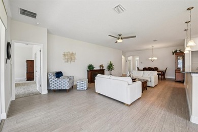 This Beautiful LIGHT AND BRIGHT *Calla II Model* Home is located on Arlington Ridge Golf Club in Florida - for sale on GolfHomes.com, golf home, golf lot