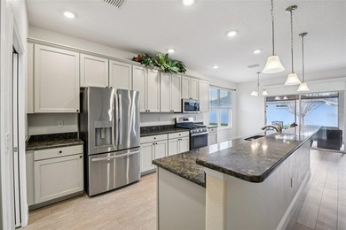 This Beautiful LIGHT AND BRIGHT *Calla II Model* Home is located on Arlington Ridge Golf Club in Florida - for sale on GolfHomes.com, golf home, golf lot