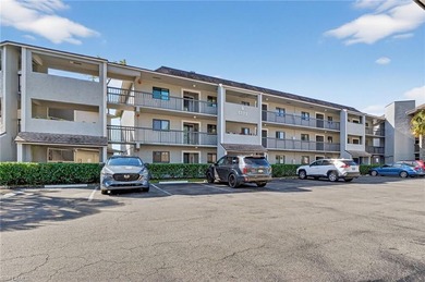 This beautifully renovated first-floor residence offers 2 on Royal Palm Golf Club in Florida - for sale on GolfHomes.com, golf home, golf lot