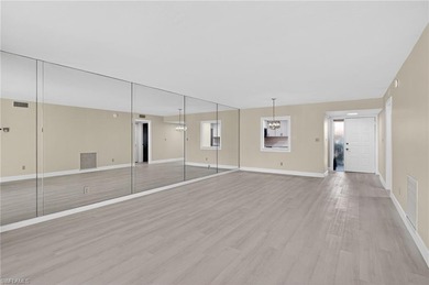 This beautifully renovated first-floor residence offers 2 on Royal Palm Golf Club in Florida - for sale on GolfHomes.com, golf home, golf lot