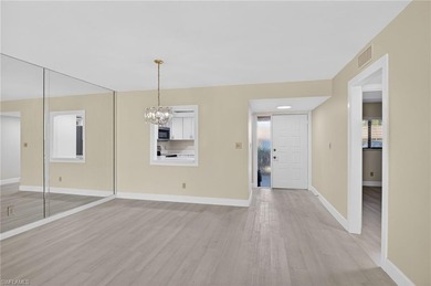 This beautifully renovated first-floor residence offers 2 on Royal Palm Golf Club in Florida - for sale on GolfHomes.com, golf home, golf lot