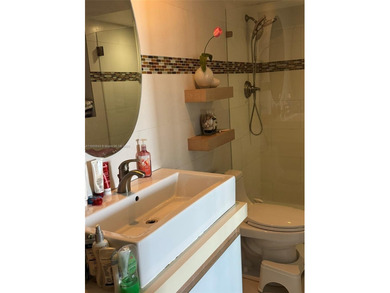 Spectacular water views from Every room in this 2 bed/2 bath on Turnberry Isle Resort and Club in Florida - for sale on GolfHomes.com, golf home, golf lot