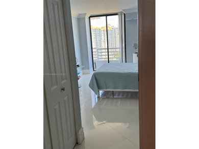 Spectacular water views from Every room in this 2 bed/2 bath on Turnberry Isle Resort and Club in Florida - for sale on GolfHomes.com, golf home, golf lot