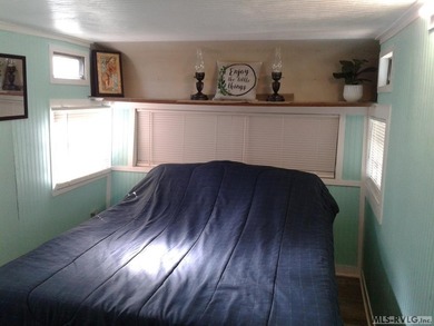 Good things do come in small packages! Take a look at this Lake on River Ridge Golf Club in Virginia - for sale on GolfHomes.com, golf home, golf lot