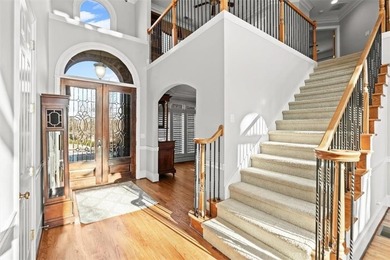 Wake up every day to sweeping golf course views overlooking the on Woodmont Golf and Country Club in Georgia - for sale on GolfHomes.com, golf home, golf lot