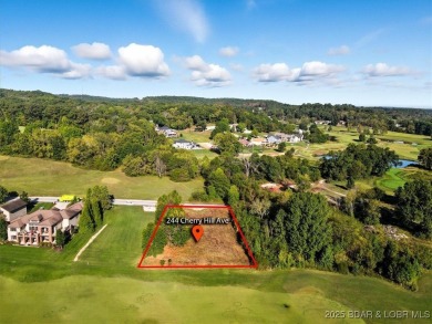 Build your dream home on this .50-acre flat lot located directly on Osage National Golf Club in Missouri - for sale on GolfHomes.com, golf home, golf lot