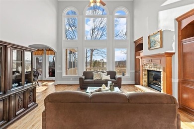 Wake up every day to sweeping golf course views overlooking the on Woodmont Golf and Country Club in Georgia - for sale on GolfHomes.com, golf home, golf lot