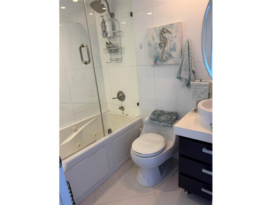 Spectacular water views from Every room in this 2 bed/2 bath on Turnberry Isle Resort and Club in Florida - for sale on GolfHomes.com, golf home, golf lot