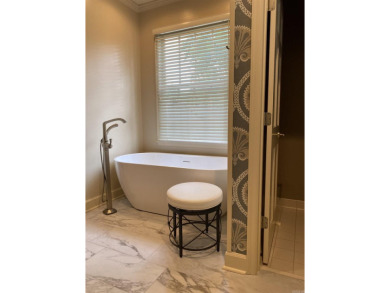 This stunning custom-built 4-bedroom home is perfectly situated on Helena Country Club in Arkansas - for sale on GolfHomes.com, golf home, golf lot
