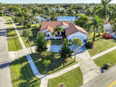 This extremely bright and expansive lakefront home in Greenview on Greenview Cove Golf Club in Florida - for sale on GolfHomes.com, golf home, golf lot