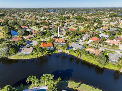 This extremely bright and expansive lakefront home in Greenview on Greenview Cove Golf Club in Florida - for sale on GolfHomes.com, golf home, golf lot