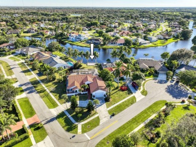 This extremely bright and expansive lakefront home in Greenview on Greenview Cove Golf Club in Florida - for sale on GolfHomes.com, golf home, golf lot