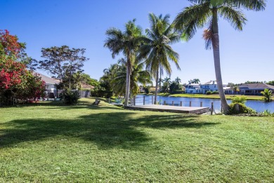This extremely bright and expansive lakefront home in Greenview on Greenview Cove Golf Club in Florida - for sale on GolfHomes.com, golf home, golf lot