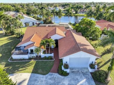 This extremely bright and expansive lakefront home in Greenview on Greenview Cove Golf Club in Florida - for sale on GolfHomes.com, golf home, golf lot