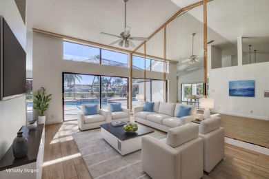 This extremely bright and expansive lakefront home in Greenview on Greenview Cove Golf Club in Florida - for sale on GolfHomes.com, golf home, golf lot