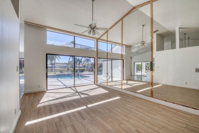 This extremely bright and expansive lakefront home in Greenview on Greenview Cove Golf Club in Florida - for sale on GolfHomes.com, golf home, golf lot