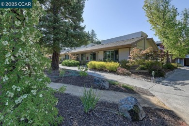 Step into this sophisticated level-in, single row and end unit on Rossmoor Golf Course in California - for sale on GolfHomes.com, golf home, golf lot