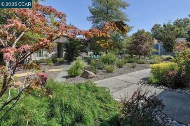 Step into this sophisticated level-in, single row and end unit on Rossmoor Golf Course in California - for sale on GolfHomes.com, golf home, golf lot