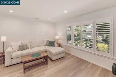 Step into this sophisticated level-in, single row and end unit on Rossmoor Golf Course in California - for sale on GolfHomes.com, golf home, golf lot