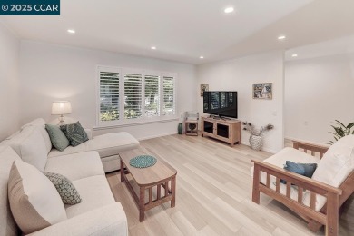Step into this sophisticated level-in, single row and end unit on Rossmoor Golf Course in California - for sale on GolfHomes.com, golf home, golf lot