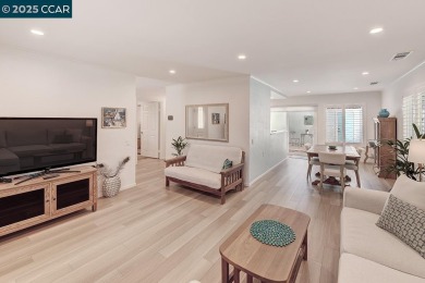 Step into this sophisticated level-in, single row and end unit on Rossmoor Golf Course in California - for sale on GolfHomes.com, golf home, golf lot