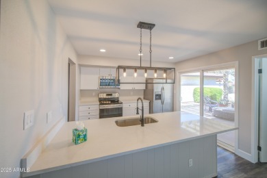 Discover this exquisite, fully remodeled 3-bed, 2-bath home in on Ahwatukee Country Club in Arizona - for sale on GolfHomes.com, golf home, golf lot