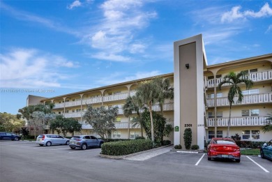 Welcome home to this desirable ground floor condo in one of the on Wynmoor Golf Course in Florida - for sale on GolfHomes.com, golf home, golf lot