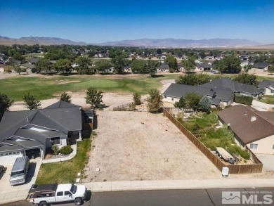 This lot backs a green on Desert Lakes Golf Course.  All on The Golf Club of Fernley in Nevada - for sale on GolfHomes.com, golf home, golf lot