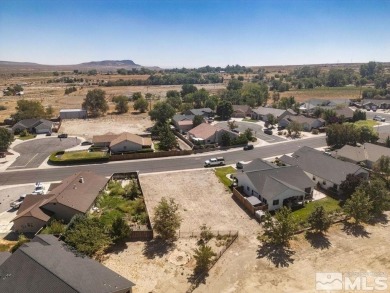 This lot backs a green on Desert Lakes Golf Course.  All on The Golf Club of Fernley in Nevada - for sale on GolfHomes.com, golf home, golf lot