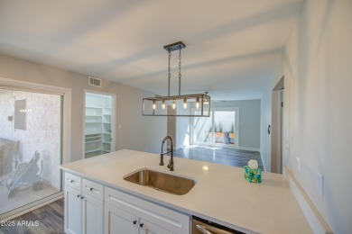 Discover this exquisite, fully remodeled 3-bed, 2-bath home in on Ahwatukee Country Club in Arizona - for sale on GolfHomes.com, golf home, golf lot