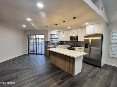 Completely remodeled and redesigned home. This is a 55+ on The Lakes at Ahwatukee in Arizona - for sale on GolfHomes.com, golf home, golf lot
