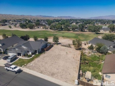 This lot backs a green on Desert Lakes Golf Course.  All on The Golf Club of Fernley in Nevada - for sale on GolfHomes.com, golf home, golf lot