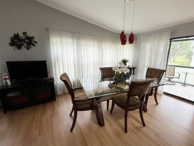 This Casa Grande model home has a view of the golf course from on Del Tura Golf and Country Club in Florida - for sale on GolfHomes.com, golf home, golf lot