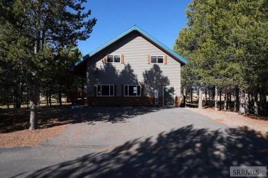 This 3,201 square foot cabin is conveniently located at the IP on Island Park Village Resort Golf Course in Idaho - for sale on GolfHomes.com, golf home, golf lot