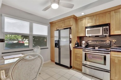 Welcome home to this desirable ground floor condo in one of the on Wynmoor Golf Course in Florida - for sale on GolfHomes.com, golf home, golf lot