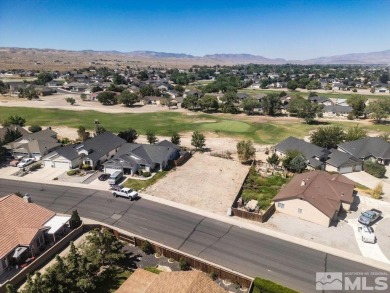 This lot backs a green on Desert Lakes Golf Course.  All on The Golf Club of Fernley in Nevada - for sale on GolfHomes.com, golf home, golf lot